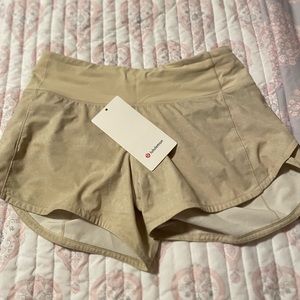 Lululemon speed up mid rise short 4”